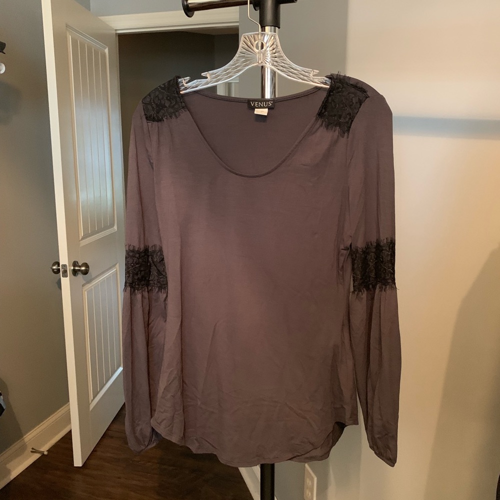 Gray top with black lace detailing.